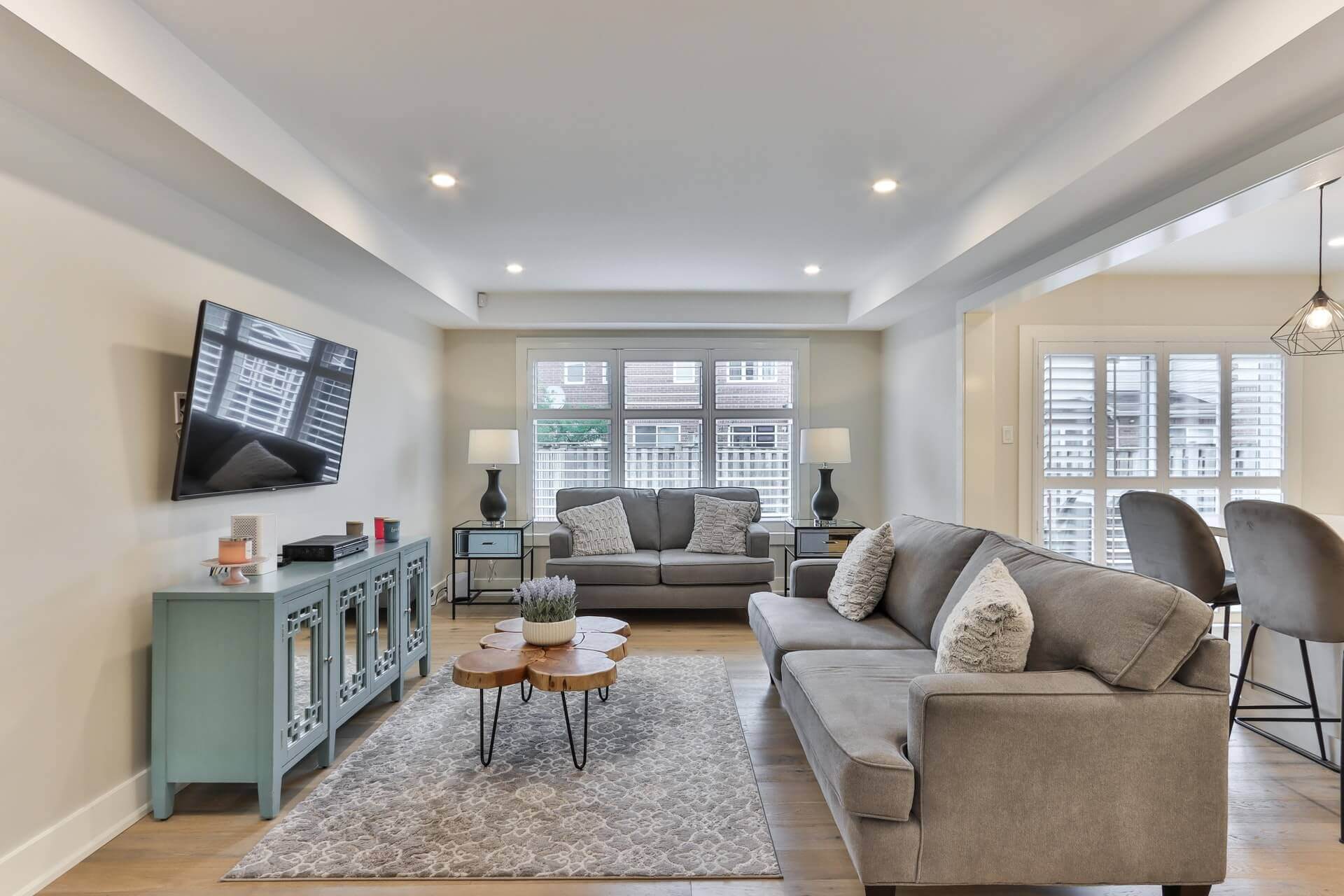 gray couch and white wooden table